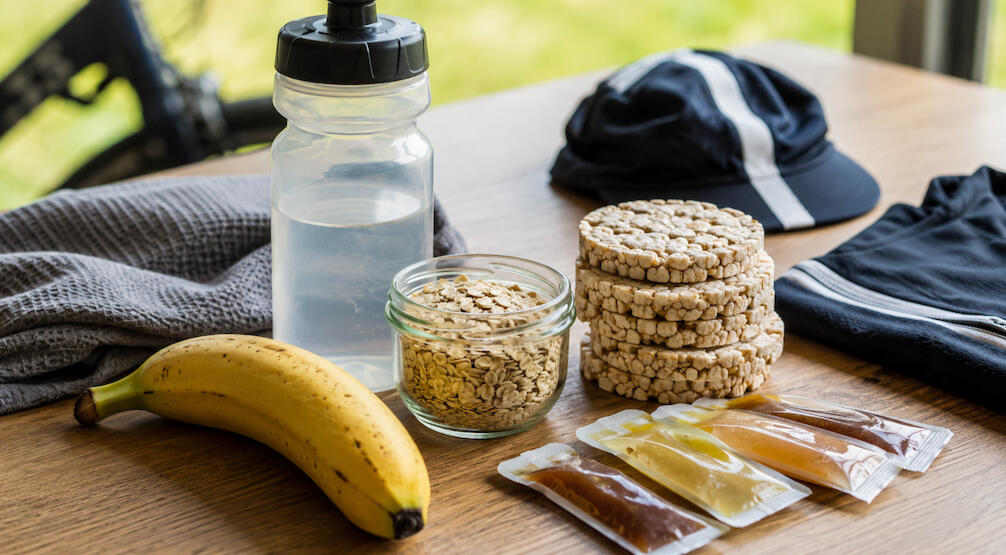 Cyclists nutrition Cycling fuelling image showing simple carbohydrate and protein foods used to support training and recovery.